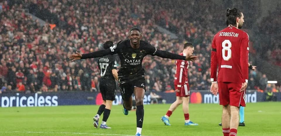 Player celebrating goal with teammates during match