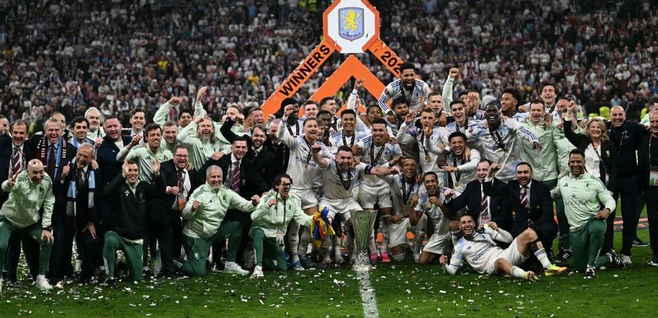 Team celebrating with trophy after winning the match