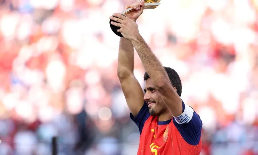 Player lifting trophy in celebration after victory