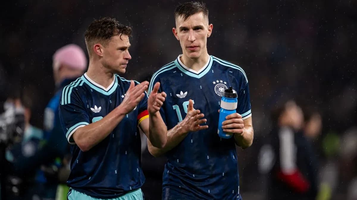 Two German players talking after a match
