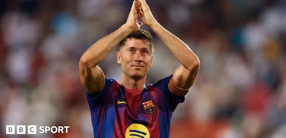 Player applauding fans during a match
