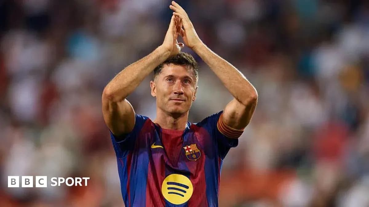 Player applauding fans during a match