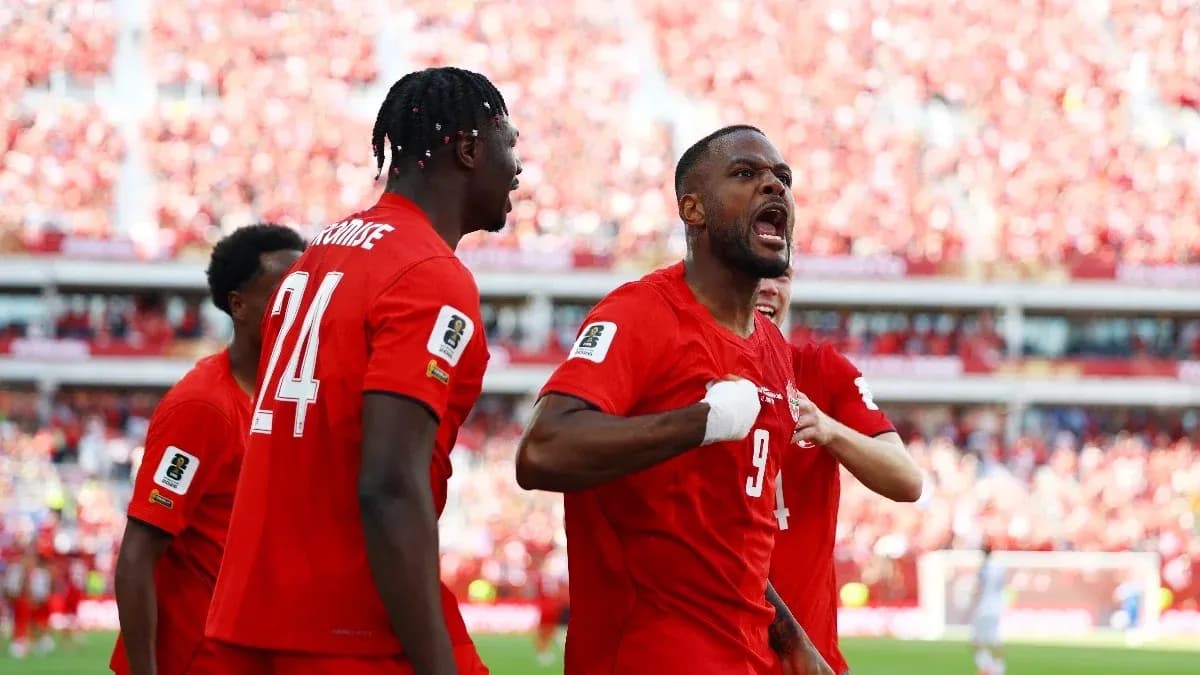 Canada players celebrating a goal during match