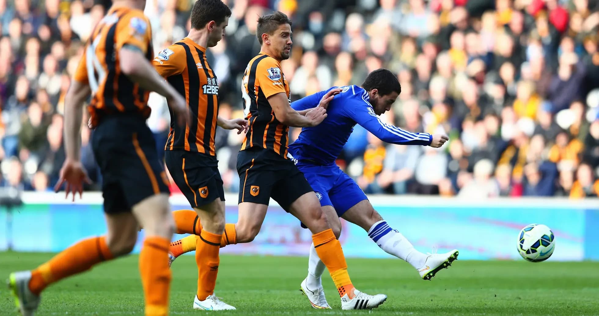 Chelsea player kicking ball against Hull City