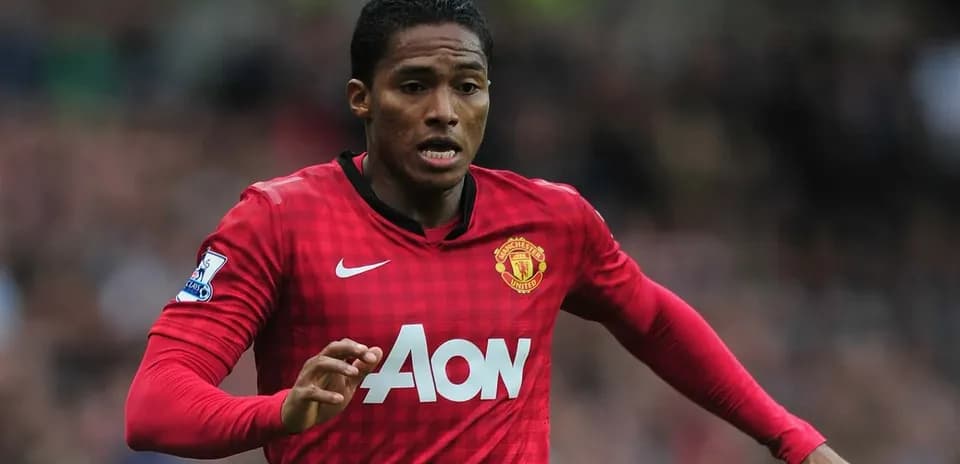 Player running on the field in Manchester United kit