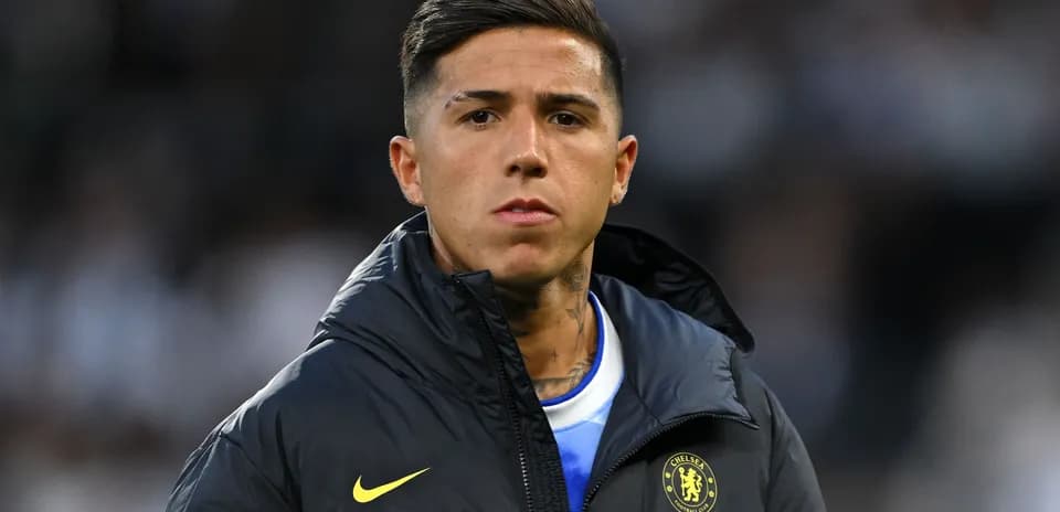 Player in Chelsea jacket before the match