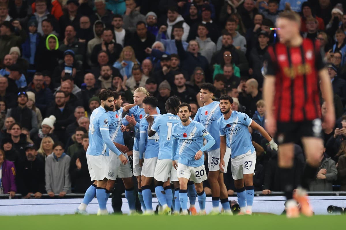 Manchester City players celebrating a goal