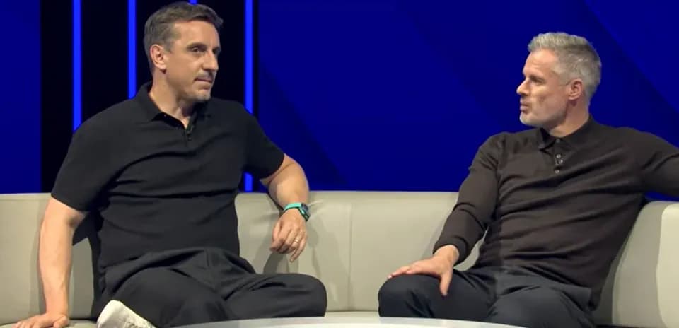 Two analysts discussing sports on a sofa
