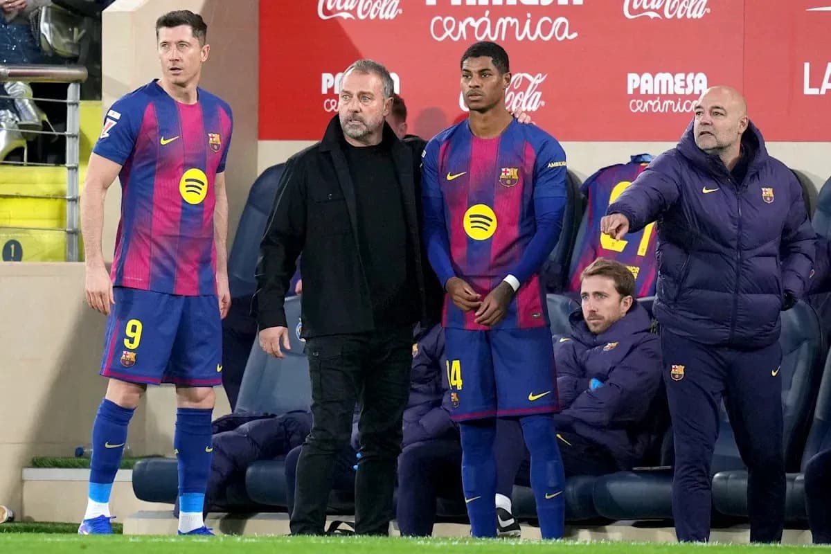 Barcelona players and coaches on the sideline