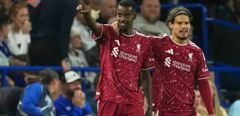 Liverpool players celebrating a goal during match