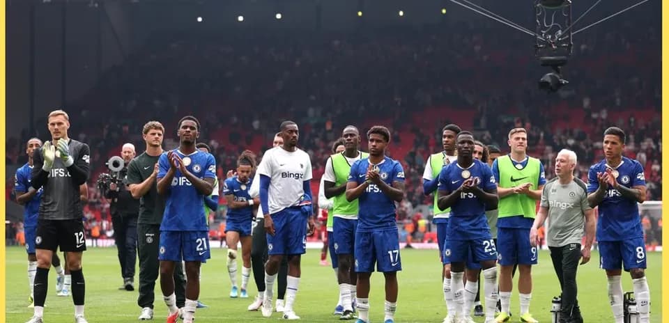Chelsea players applauding fans after match