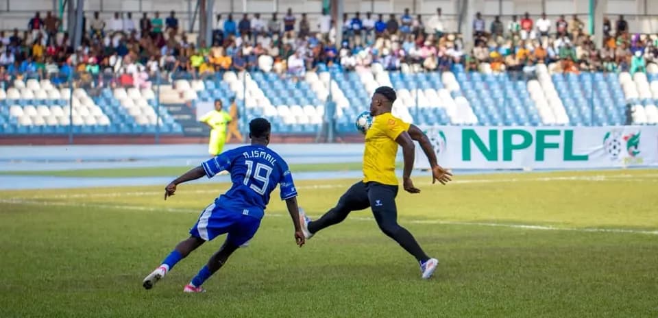 Player attempting to score against goalkeeper
