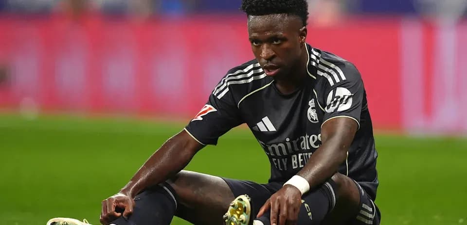 Player sitting on pitch during match