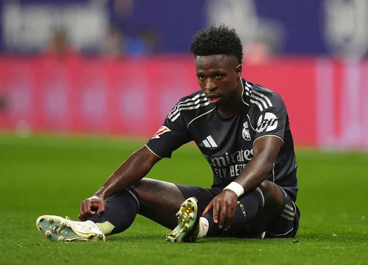 Player sitting on pitch during match