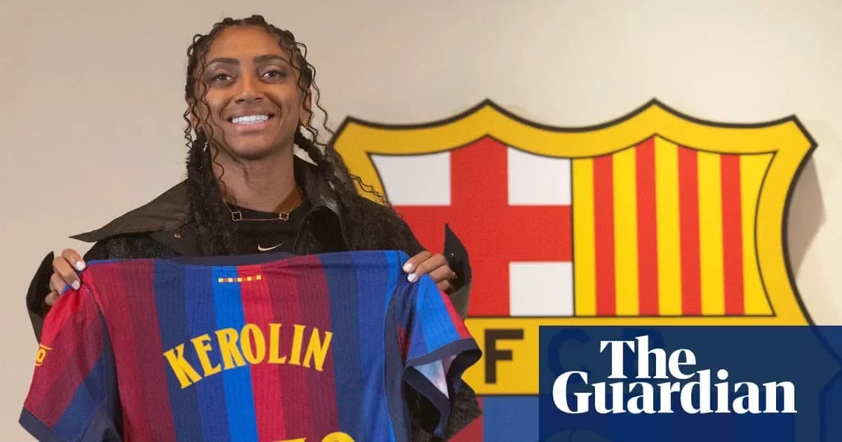 Player holding FC Barcelona jersey during presentation