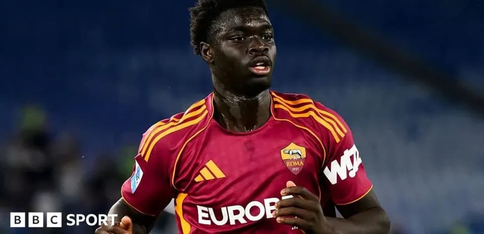 Player in AS Roma kit during match action
