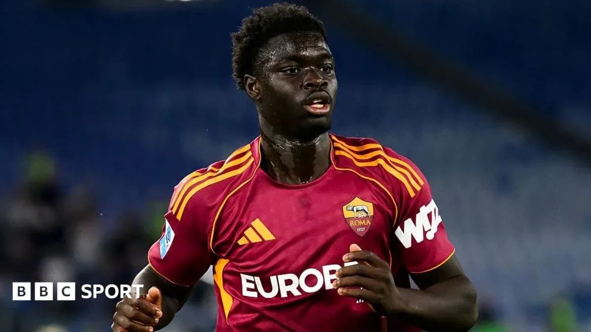 Player in AS Roma kit during match action