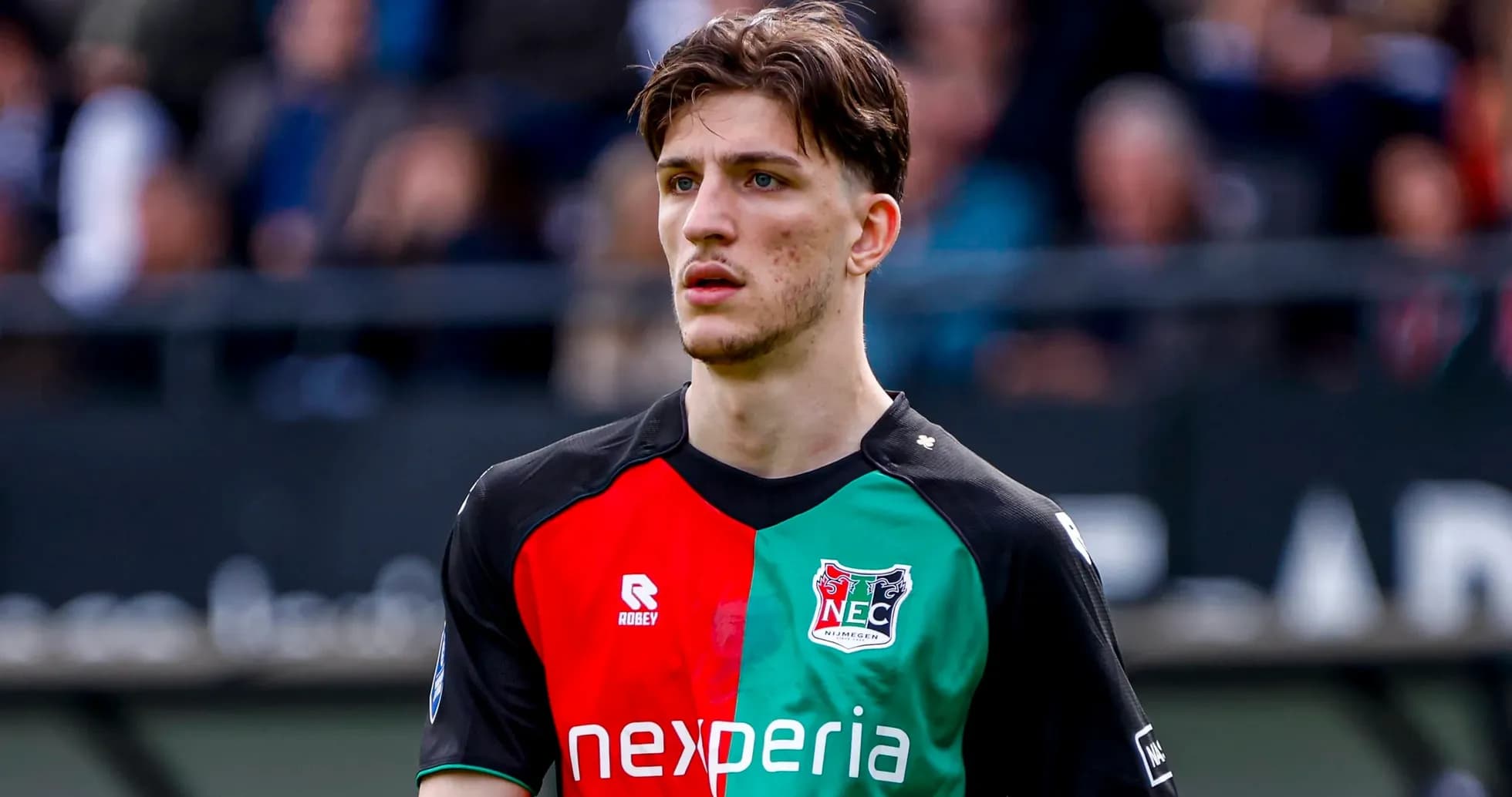 Player wearing NEC Nijmegen jersey on the field