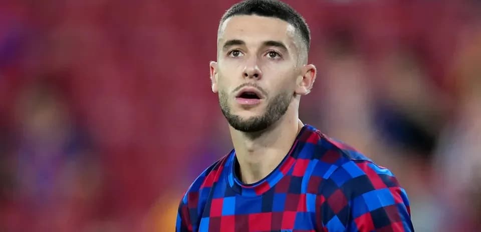 Football player in Barcelona jersey on the pitch