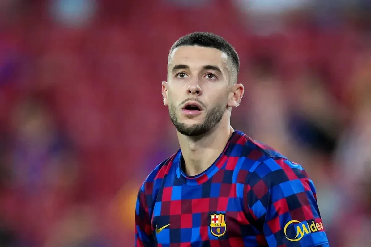 Football player in Barcelona jersey on the pitch