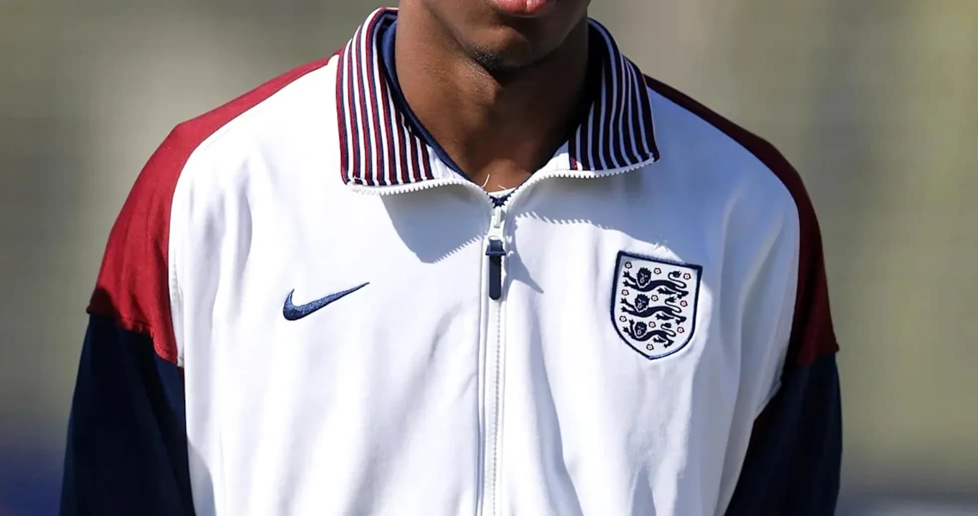 Player in England training jacket during session