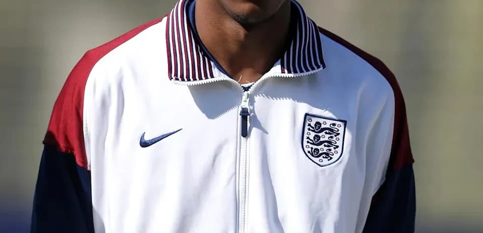 Player in England training jacket during session