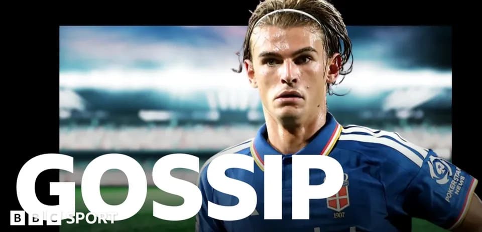 Player in blue jersey with stadium background