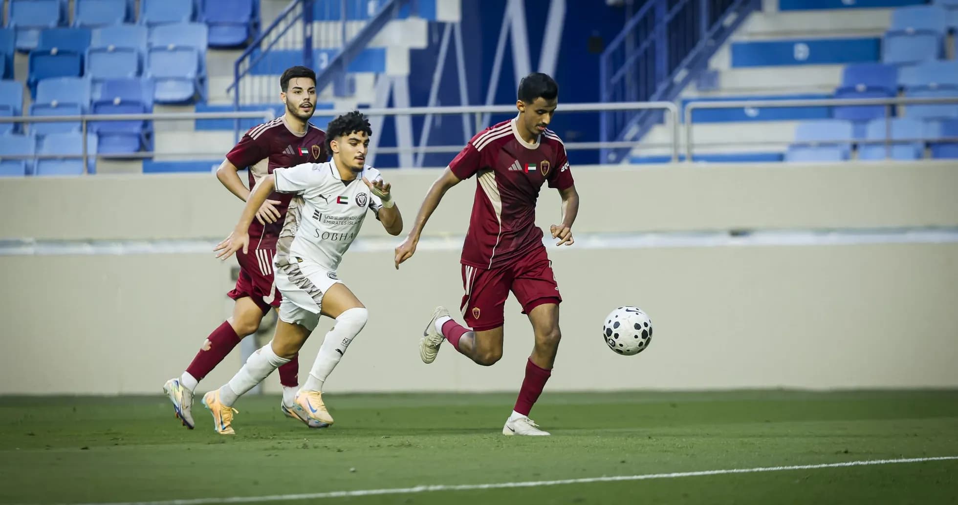 Al Jazira U23 player chasing the ball