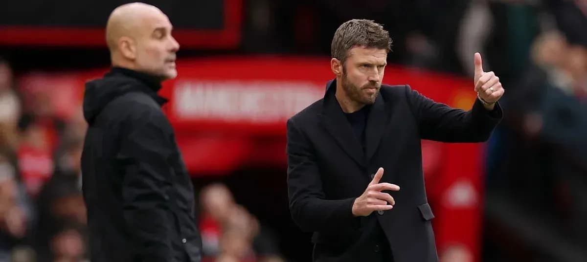 Two managers on sidelines during football match
