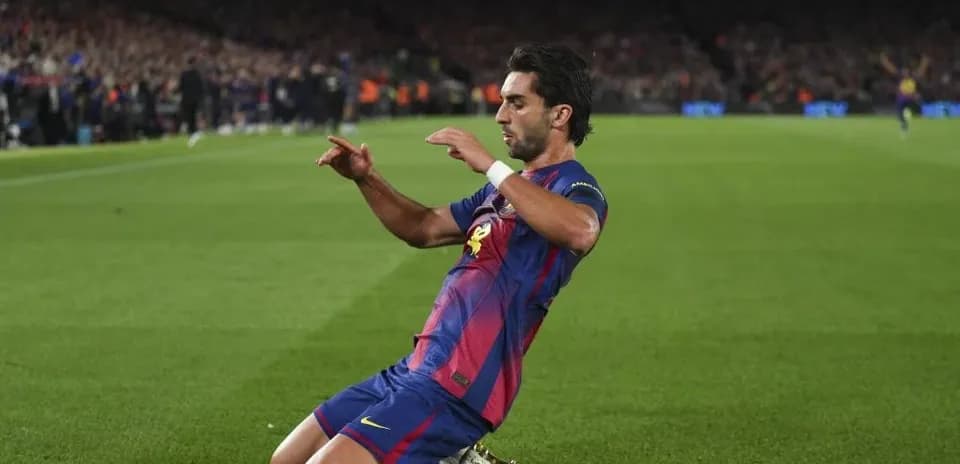 Player celebrating a goal on the pitch