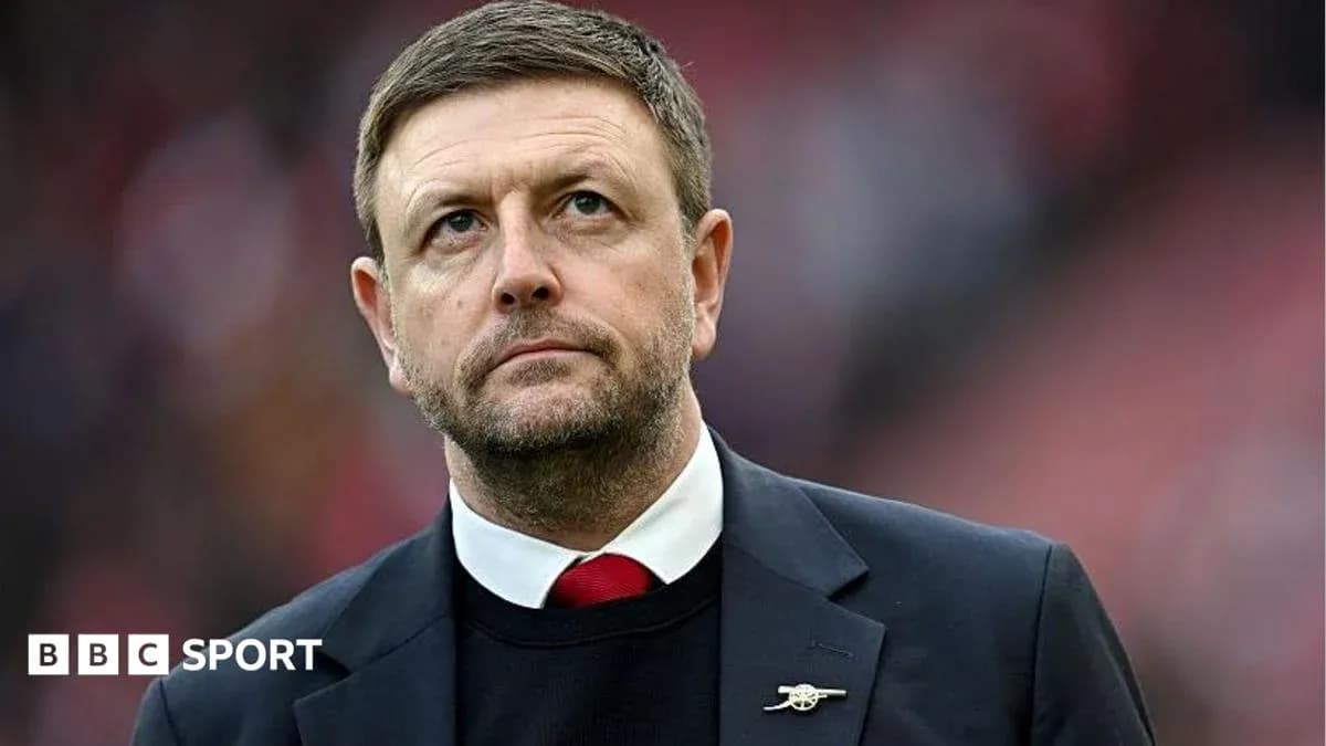 Manager looking up during a match
