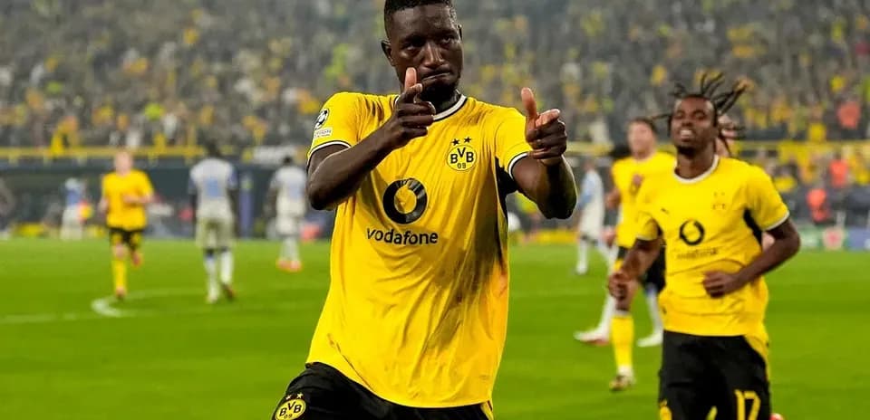 Player celebrating goal in Borussia Dortmund jersey