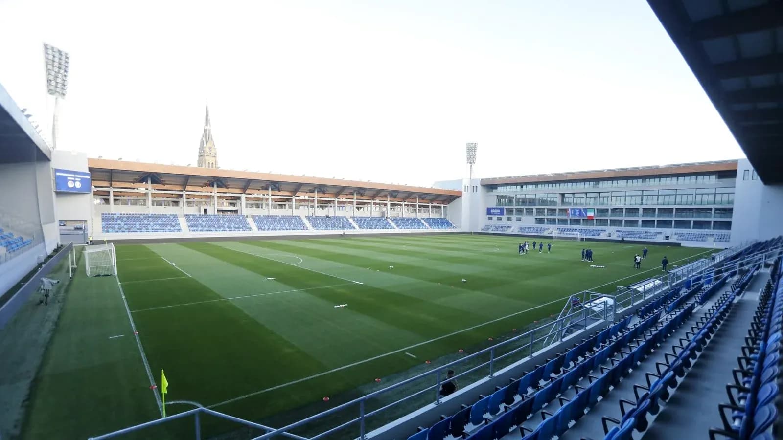 Training session at a modern football stadium