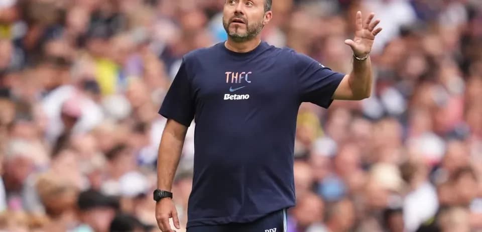 Coach directing players during a match