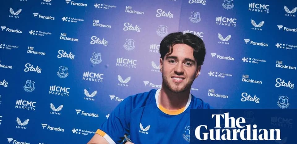 Player signing contract at Everton FC announcement event