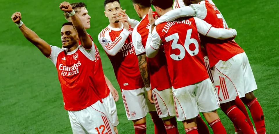 Arsenal players celebrating a goal during match