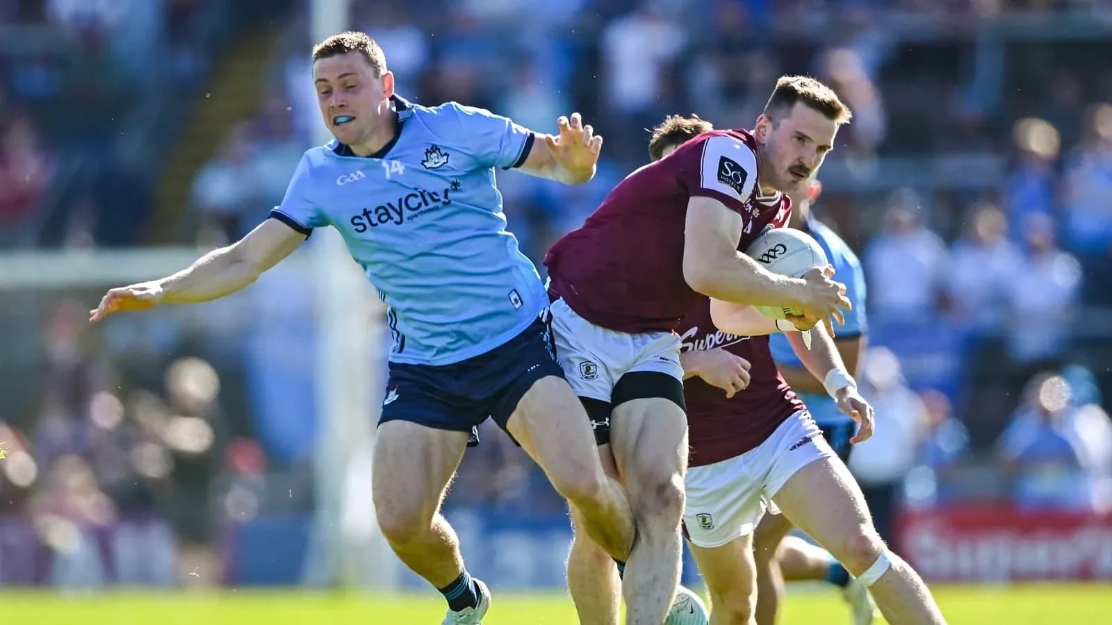 Player tackling opponent during a rugby match