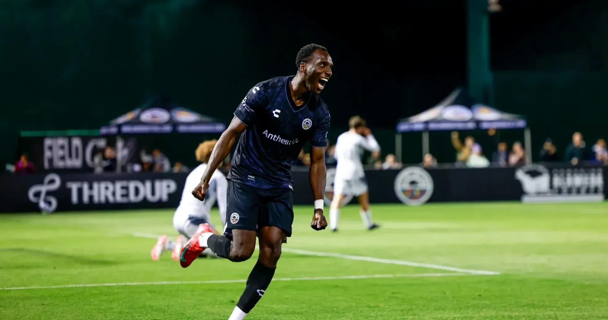 Player celebrating after scoring a goal