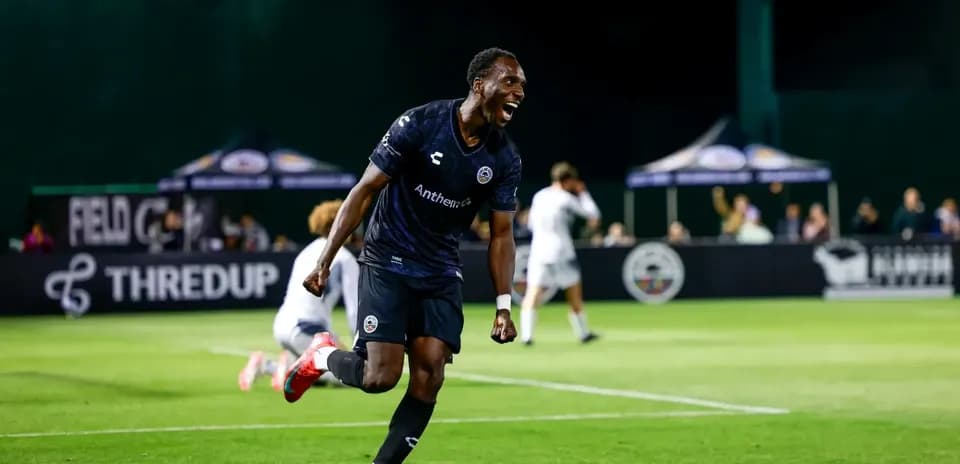 Player celebrating after scoring a goal