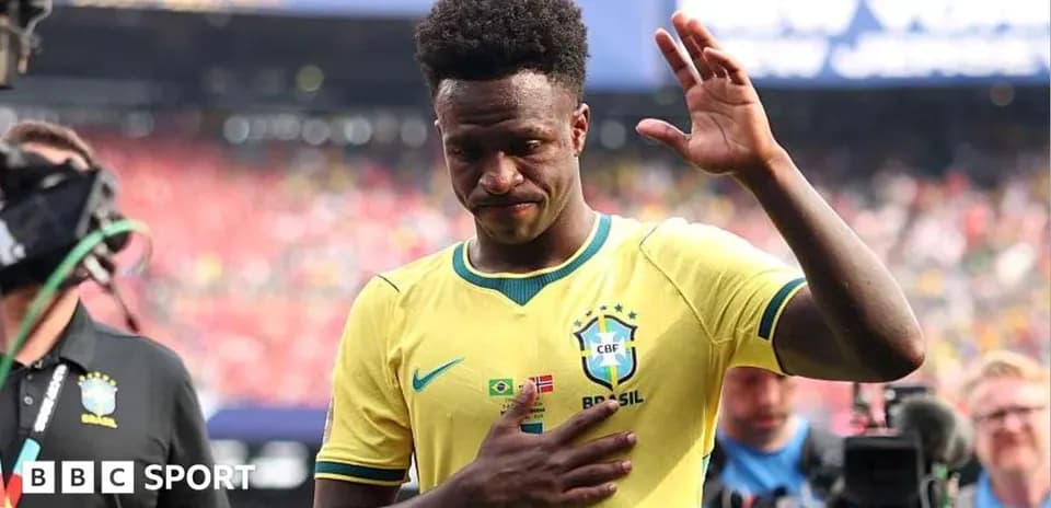 Player in Brazil jersey waving to the crowd
