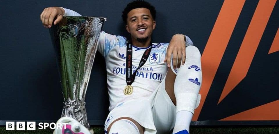 Player celebrating with trophy after winning match