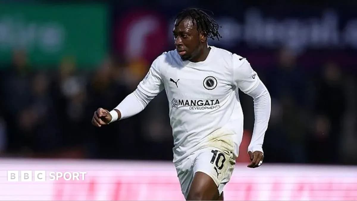 Player celebrating after scoring a goal during match