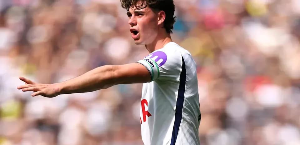 Player gesturing on field during match