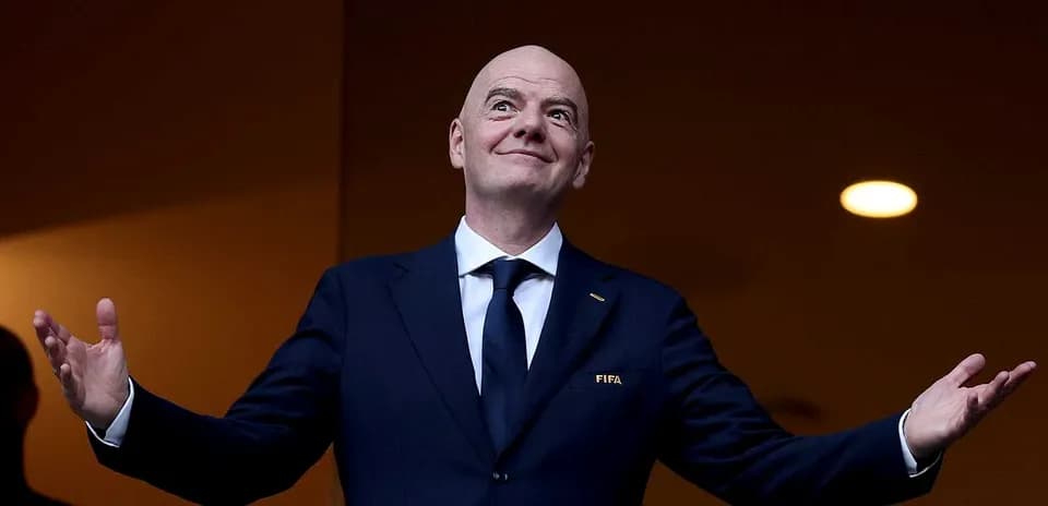 FIFA president gesturing at an event