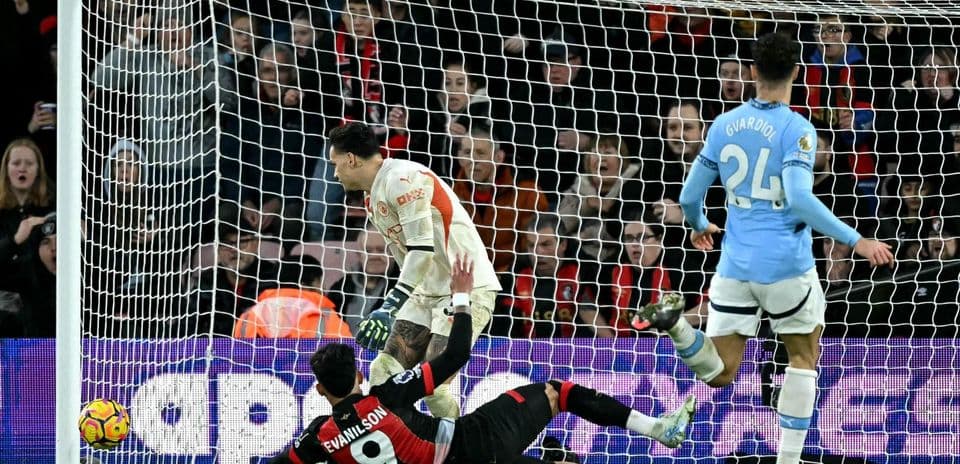 Bournemouth player scoring against Manchester City