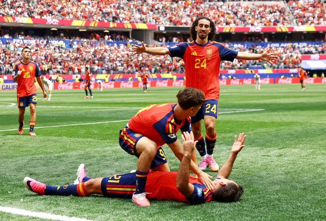 Spain players celebrating a goal during match