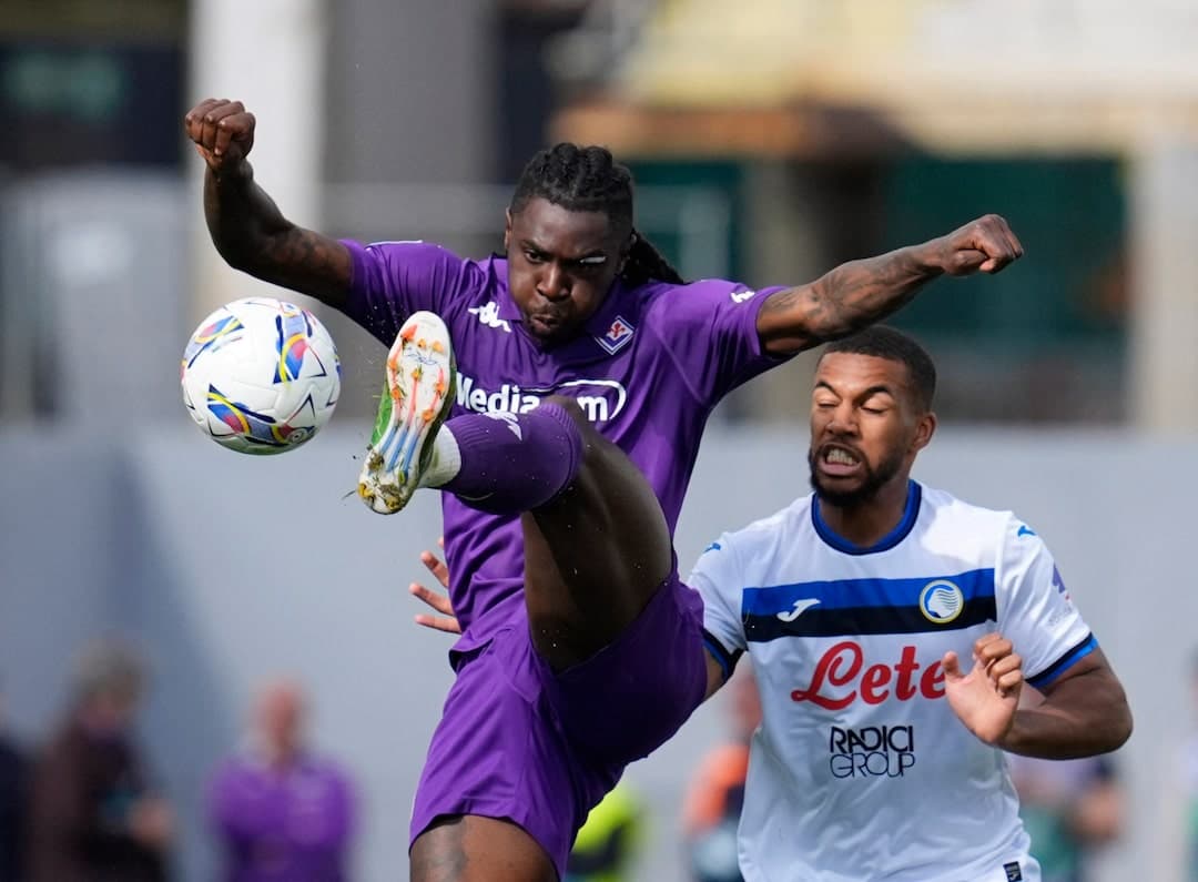 Fiorentina player kicking ball during match