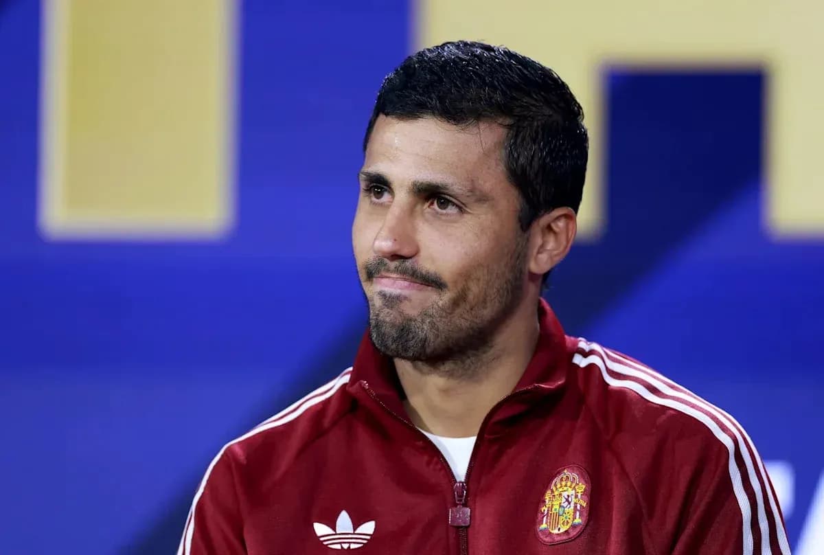 Football player in Spain tracksuit at press conference