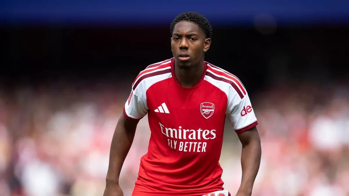 Player in Arsenal kit during match action