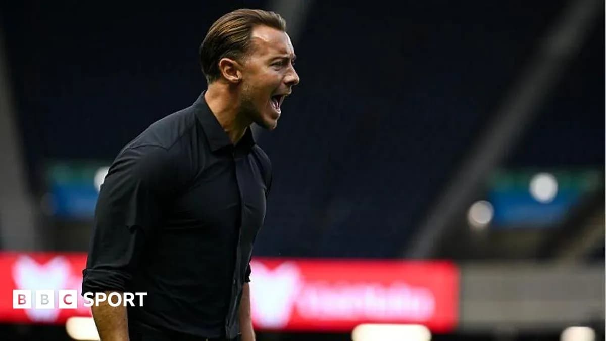 Coach shouting from the sidelines during match